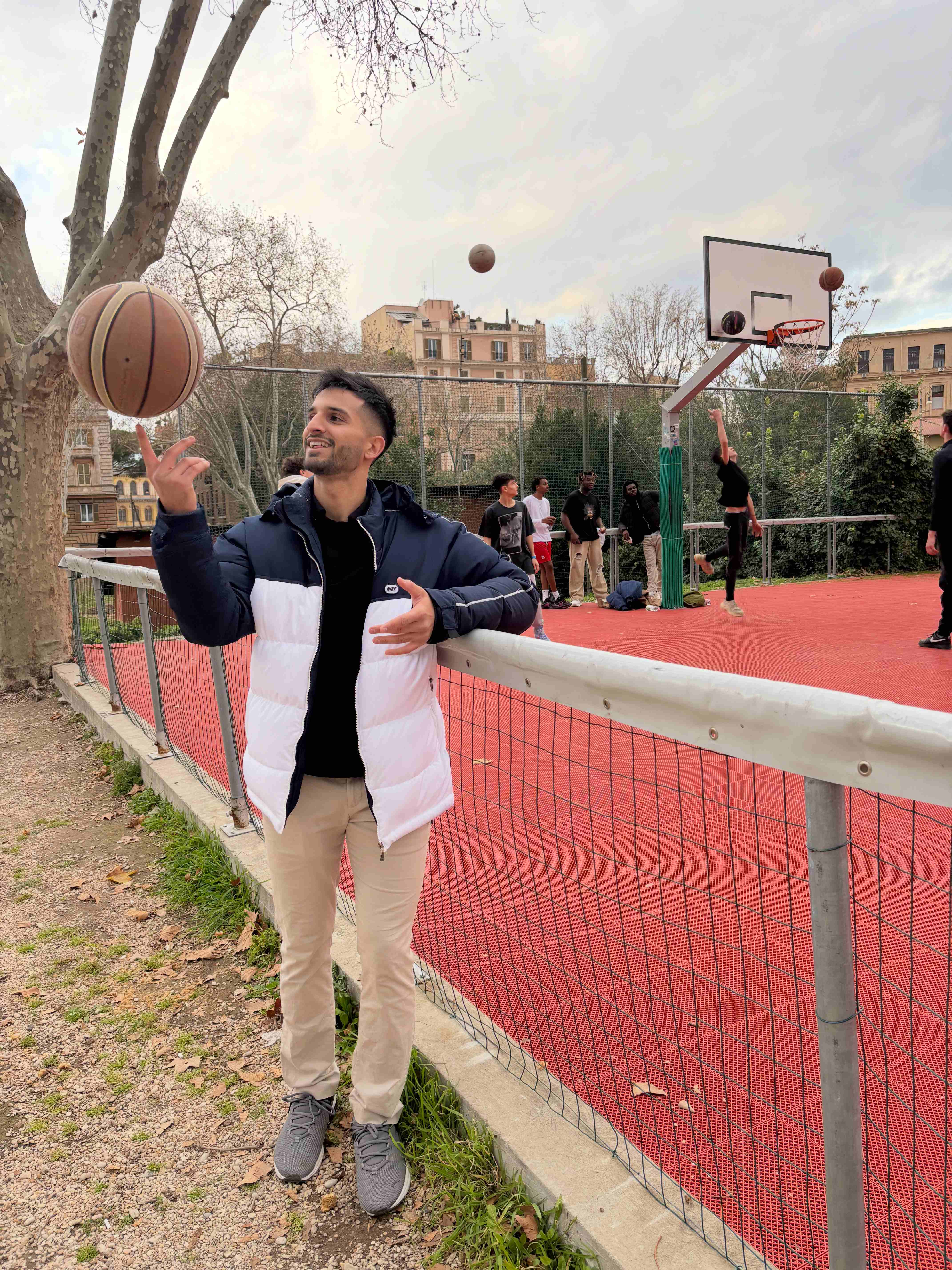 Hadi playing basketball in Rome